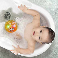 Bath toy ball with light effects, fountain and motorised drive for children