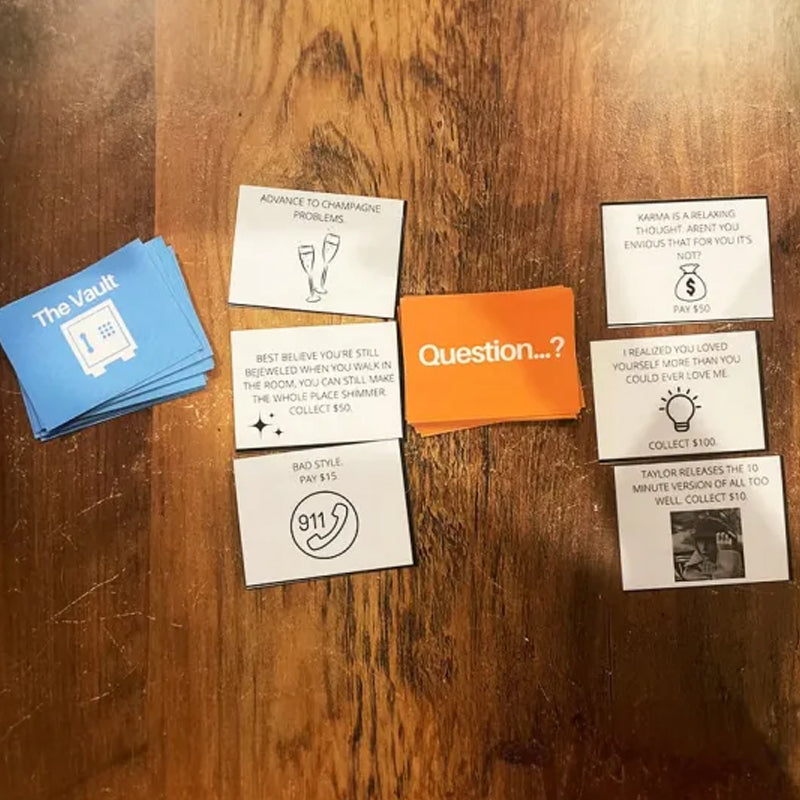 Music-based board game with song cards and Monopoly money for game nights