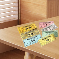 Music-based board game with song cards and Monopoly money for game nights