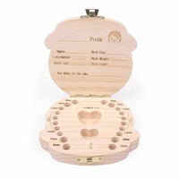 Wooden box for baby teeth with compartments, as a keepsake of the transition from baby to adult teeth.