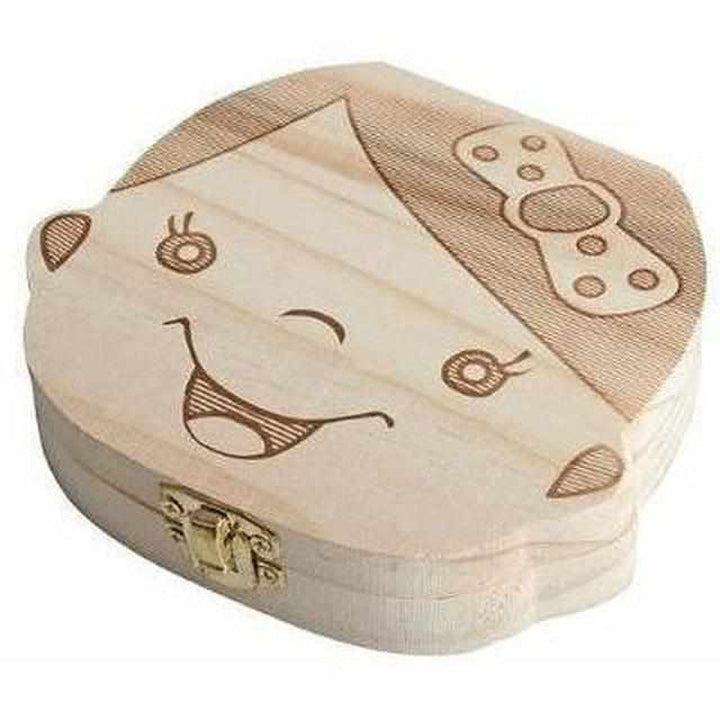 Wooden box for baby teeth with compartments, as a keepsake of the transition from baby to adult teeth.
