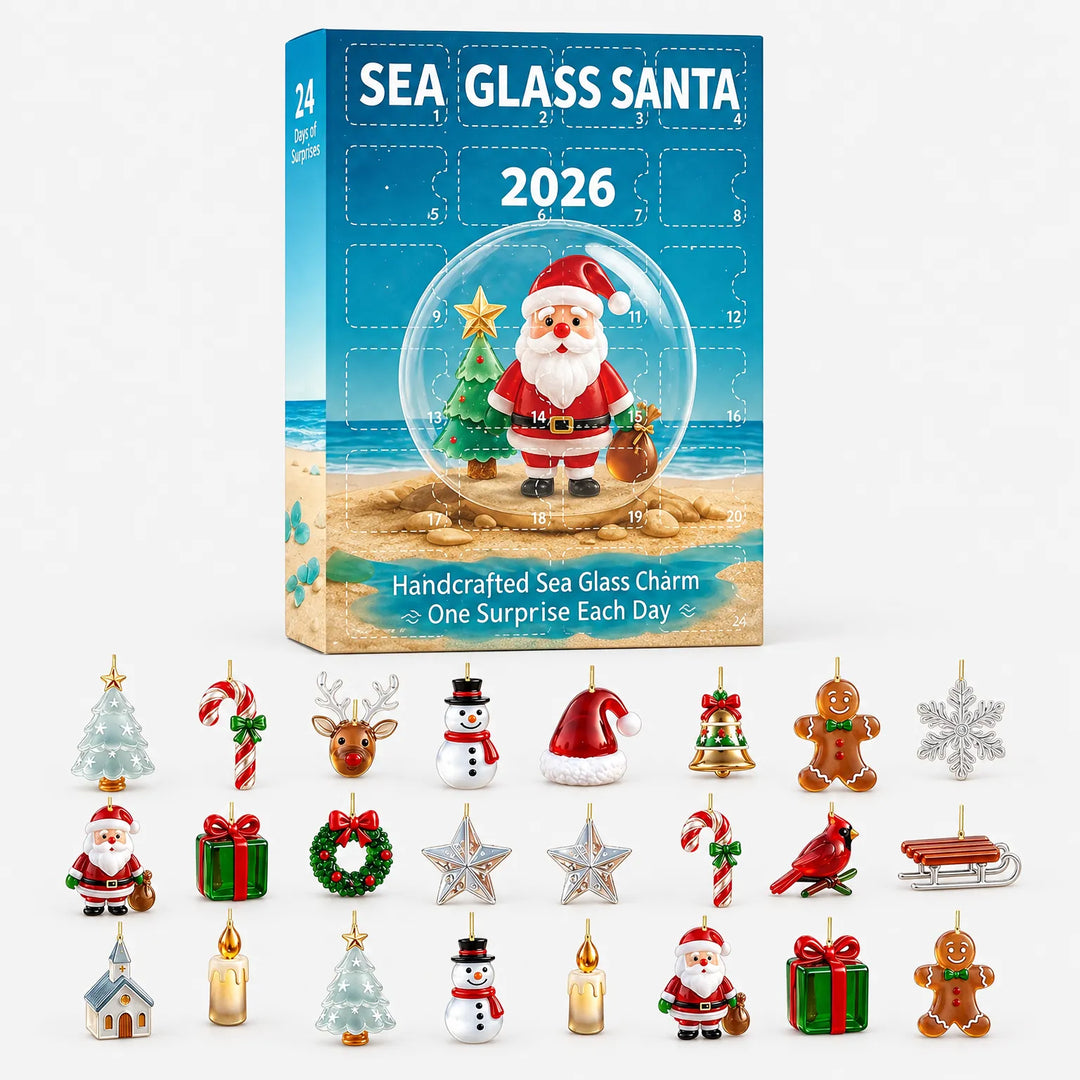 Boxed advent calendar with numbered doors on a beach scene, with all 24 festive charms laid out in rows below it. 2