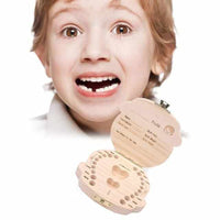Wooden box for baby teeth with compartments, as a keepsake of the transition from baby to adult teeth.