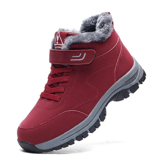 Red high-top boot with soft grey fleece collar, hook-and-loop strap, laces and grey chunky sole, side view 5