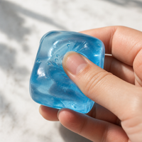 Hand squishing translucent jelly cube ASMR