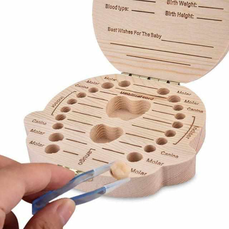 Wooden box for baby teeth with compartments, as a keepsake of the transition from baby to adult teeth.