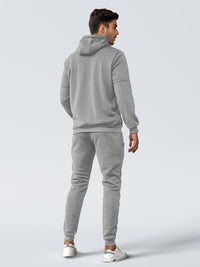 Back view of a model wearing the grey hooded tracksuit with ribbed hem and cuffs 27