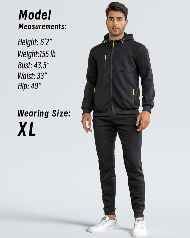 Model in a black zip-up hooded tracksuit with bright green zip pulls, full-length front view with size information 21