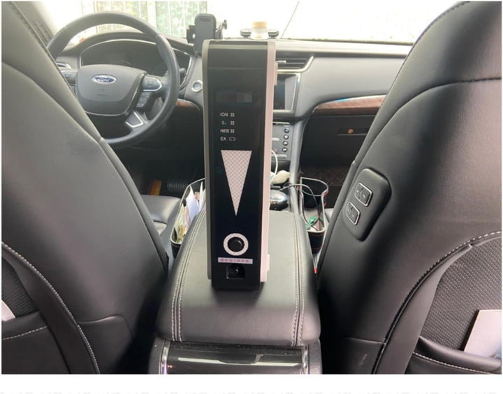 Unit standing upright on a car's rear armrest between two black leather seats, showing in-vehicle use 6