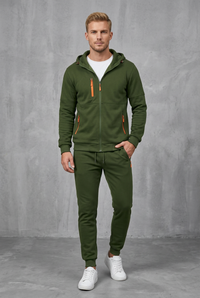 Front view of the olive green hooded set with bright orange zips, worn with a white tee 6