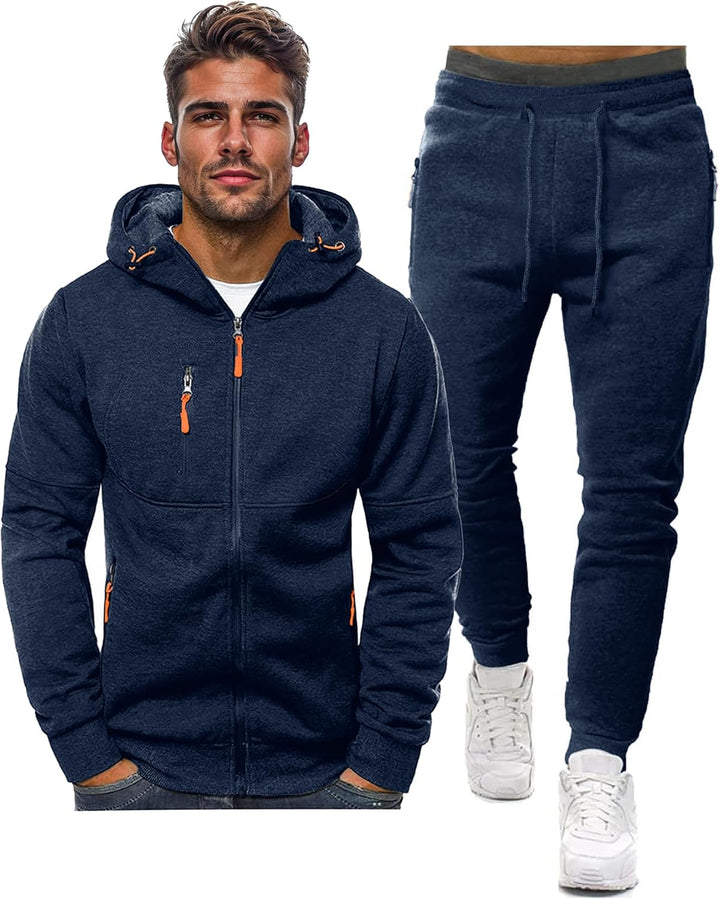 Navy hooded zip jacket worn by a model beside matching drawstring joggers, orange zip pulls 2