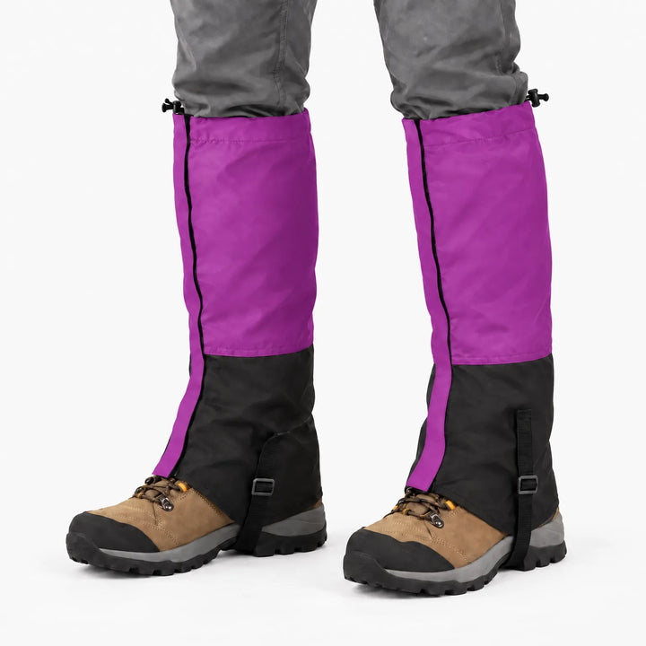 Purple and black gaiters worn over hiking boots on a white background, showing drawcords, side zip and instep straps 8