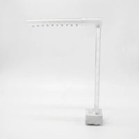 Detached white and clear water-spout assembly with a pump base, a tall clear tube and a horizontal arm with ten nozzles. 3