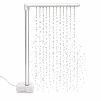 White bird shower with an L-shaped spray arm and square pump base, water falling in many fine streams on a plain background. 1