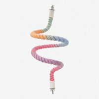 Full length of the twisted rope perch bent into a zigzag, fading from green through orange, blue, pink and purple, with metal bolt fittings at both ends. 1