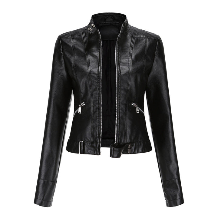 Front view of the black cropped jacket, unzipped, with stand collar, diagonal zip pockets and buckled waist tab 3