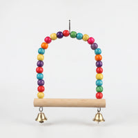 Front view of the swing on a plain light background, showing the bead arch, wooden perch bar and both bells. 5