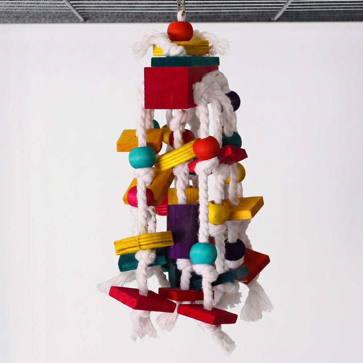 Another style hanging from a cage top, with white knotted cotton ropes, coloured wooden beads, flat blocks and a large red cube. 6