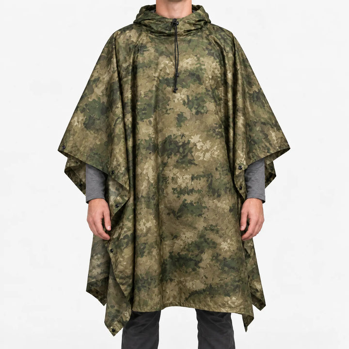 Front view of the hooded poncho in a green and tan blotchy digital camouflage pattern, with a drawcord at the hood. 10