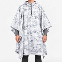 Front view of the hooded poncho in a white and light grey snow camouflage pattern, with snap closures along the sides. 11