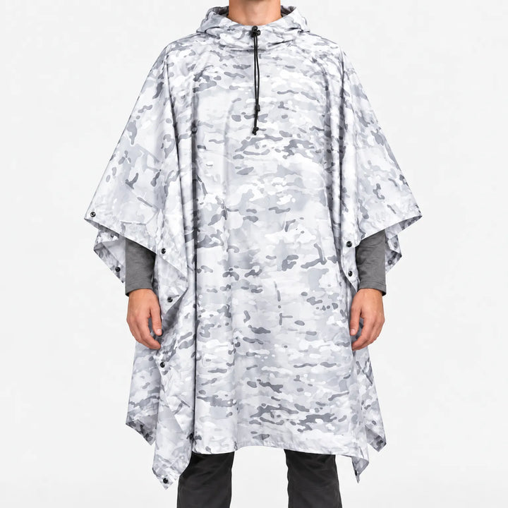 Front view of the hooded poncho in a white and light grey snow camouflage pattern, with snap closures along the sides. 11