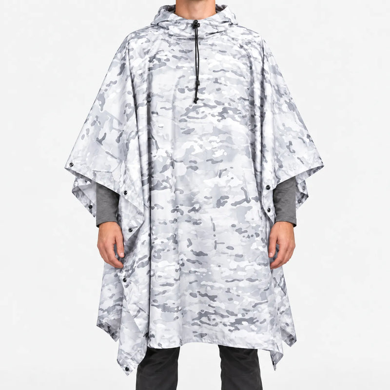 Front view of the hooded poncho in a white and light grey snow camouflage pattern, with snap closures along the sides. 11
