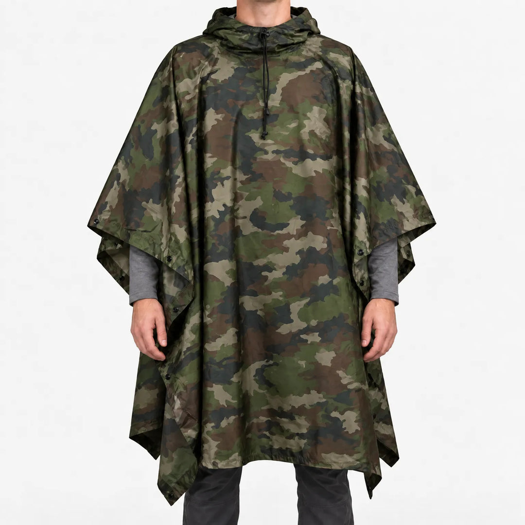 Front view of the hooded poncho in a classic woodland camouflage pattern of green, brown and black blotches. 14