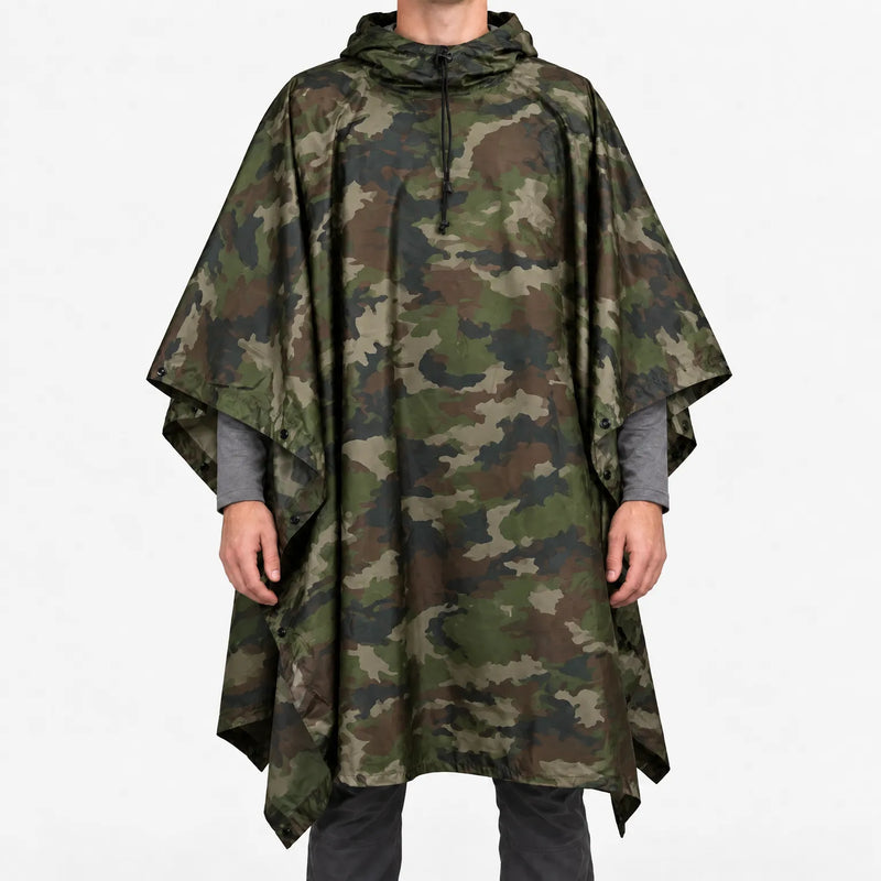 Front view of the hooded poncho in a classic woodland camouflage pattern of green, brown and black blotches. 14