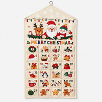 Front view of the cream canvas advent calendar on a plain background, showing Santa, a reindeer, a snowman and 24 numbered pockets. 2