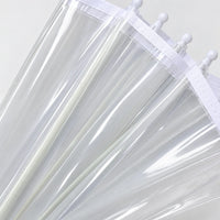 Close-up detail of the transparent canopy panels, white fabric trim along the edge and rounded white tips on the ribs. 4