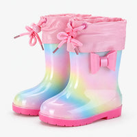 Pair of rainbow wellies with a pink drawstring cuff tied in a bow and a pink bow on the shaft. 10