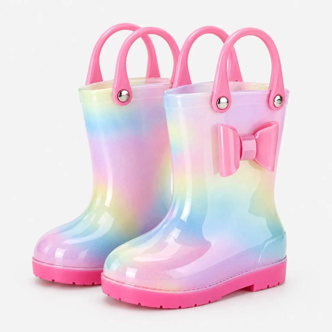 Pair of pastel rainbow wellies with two pink carry handles each, a pink bow and a pink sole. 2