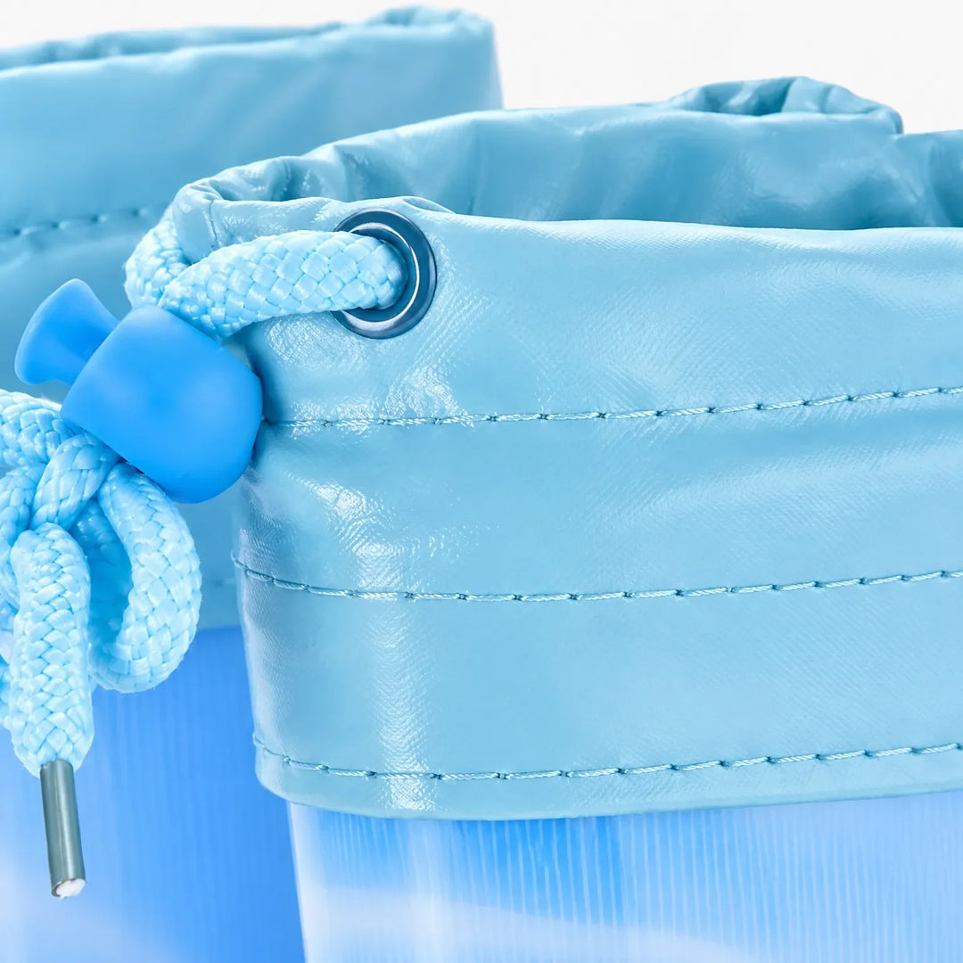 Close-up of a blue welly's drawstring cuff showing the braided cord, toggle, metal eyelet and stitched fabric. 6