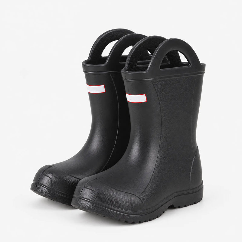 Black wellies with handles shown at a three-quarter angle, revealing the side profile, toe cap and chunky tread sole. 5