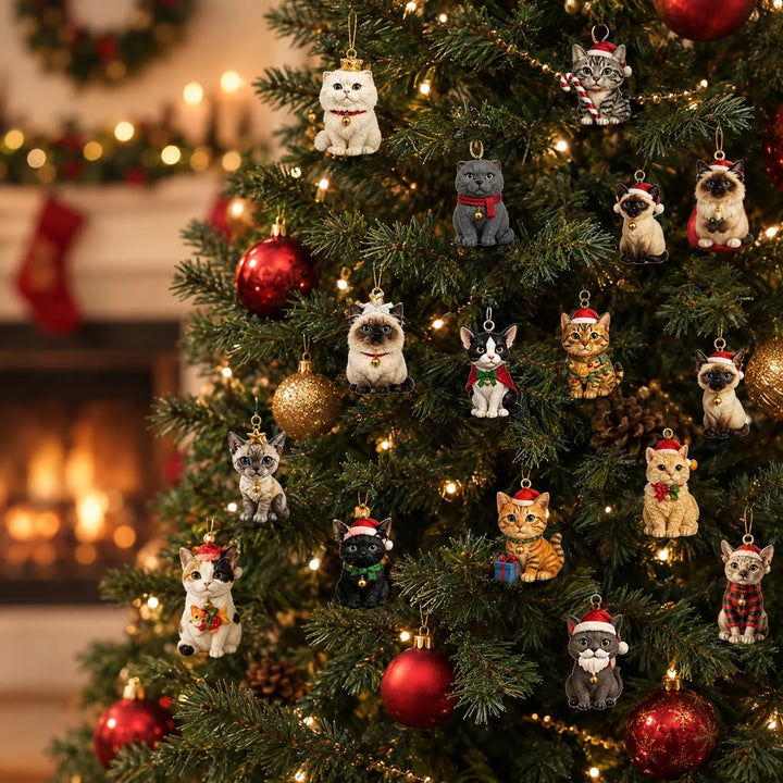 Many small cat ornaments in Santa hats and scarves hanging on a lit Christmas tree, with a fireplace glowing behind. 1