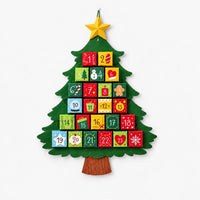 Felt tree-shaped advent calendar with 24 numbered pockets, yellow star on top and brown trunk, shown on a plain white background. 2