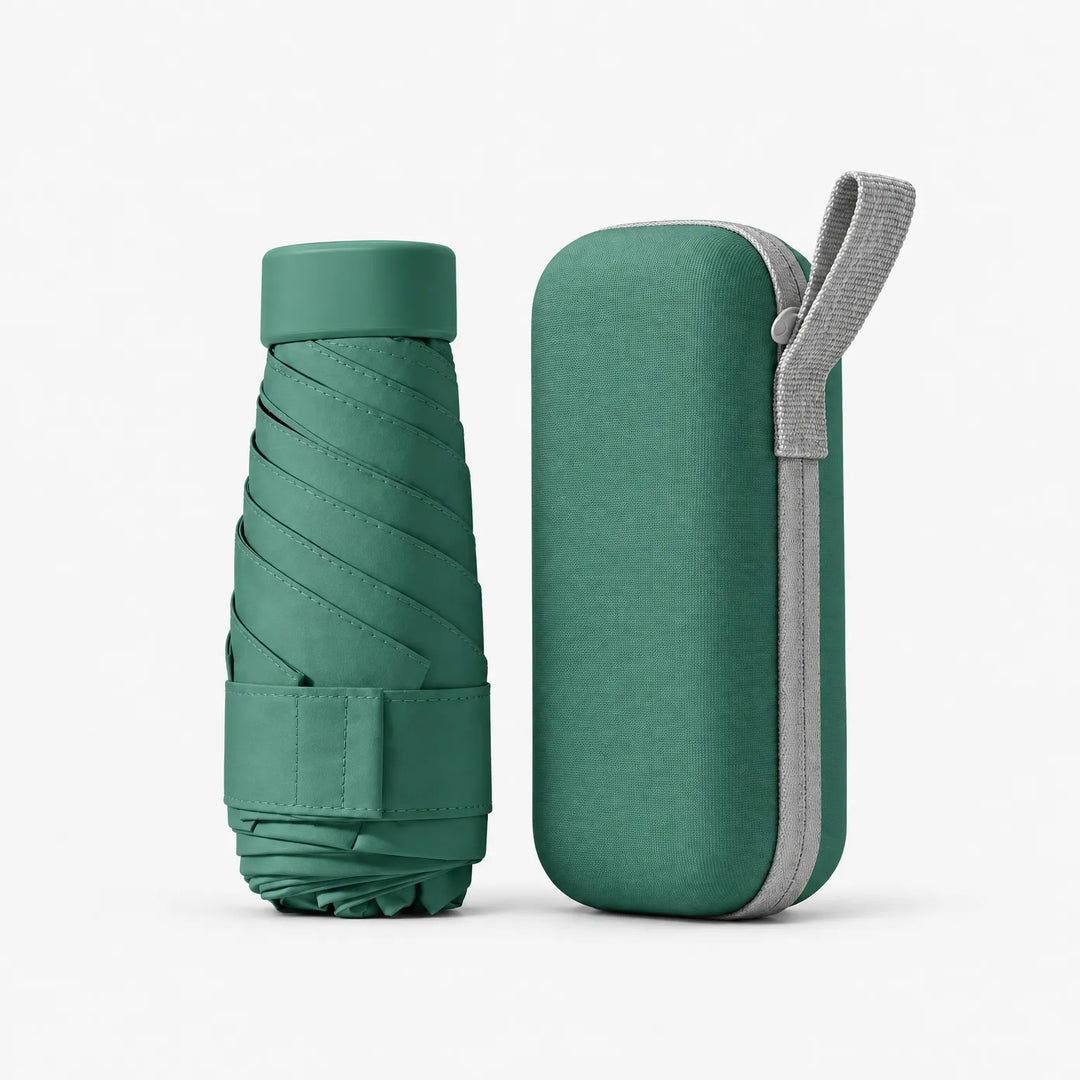 Dark green folded umbrella with cap and strap beside a matching hard zippered case with a light grey wrist loop, on white. 14