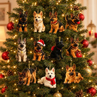 Eleven dog ornaments in varied poses and outfits hang from golden cords on a lit Christmas tree with red and gold baubles. 1