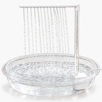 Clear shallow bath with a white pump and overhead bar, rows of water streams falling into the filled dish against a plain white background. 1