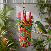 Same hanging toy in a cage beside a green and yellow parakeet perched on a branch, with leafy plants behind. 2