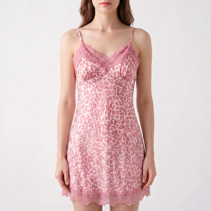 Model wearing the pink leopard-print satin slip nightdress with a lace-trimmed V-neckline, thin straps and a scalloped lace hem. 2