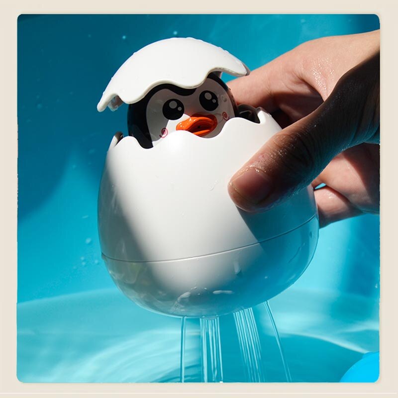 Hatching egg bath toy with animal figurine – Buy one, get one free – duck, dinosaur & penguin