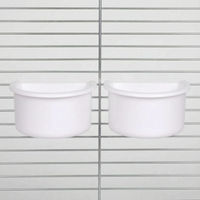 Two white half-round bowls hanging side by side on cage bars, the white version of the same design. 5