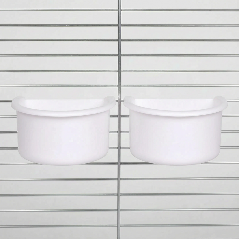 Two white half-round bowls hanging side by side on cage bars, the white version of the same design. 5