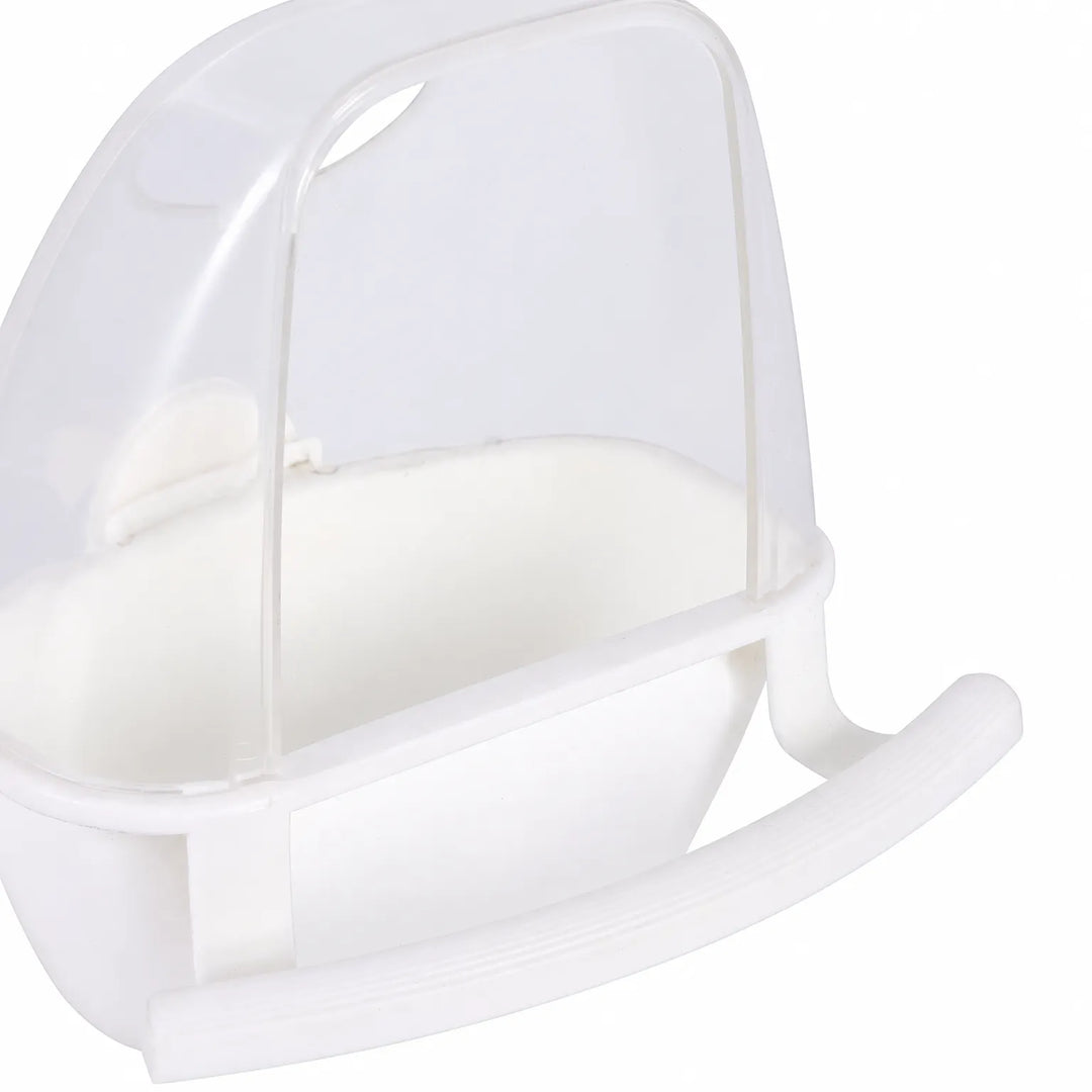 Close-up of the white version, showing the clear hood, the small inner flap and the moulded perch bar. 3
