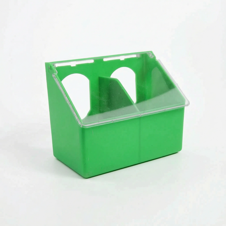 Wider two-compartment version of the green feeder with a central divider and two arched openings under the clear lid. 5