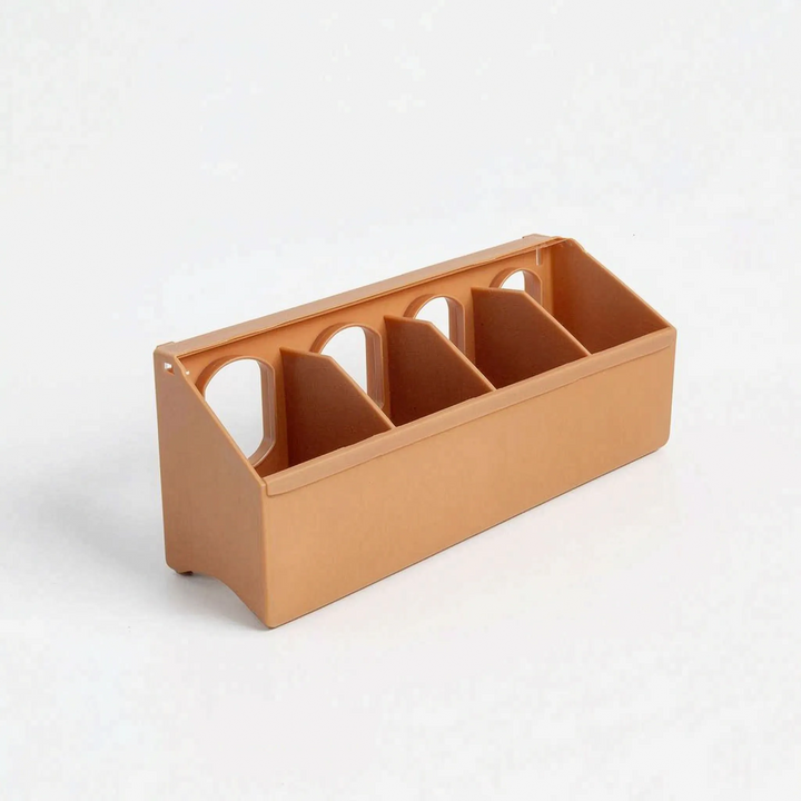 Longer four-compartment version in light brown plastic, shown without a lid, with dividers and arched openings along the back. 6