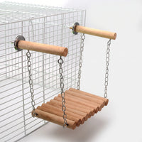 Plain wooden dowel bridge on chains, suspended from two perches fixed to the side of a white wire cage. 5