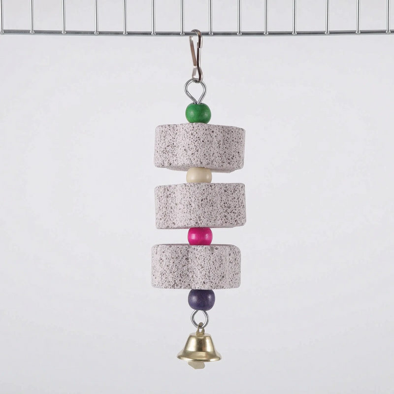 Version with three round stone discs separated by cream, pink and purple beads, topped with a green bead and finished with a bell, clipped to cage wire. 7