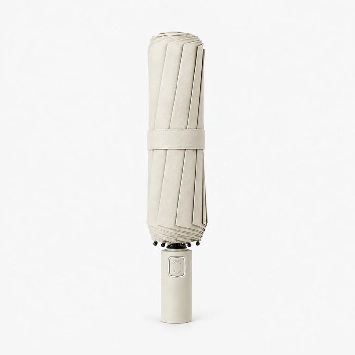 Folded cream-colored umbrella with a matching strap and handle, shown upright on a white background. 10